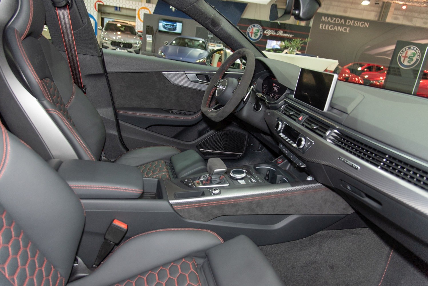 Sporty luxury interior with leather seats and advanced cockpit