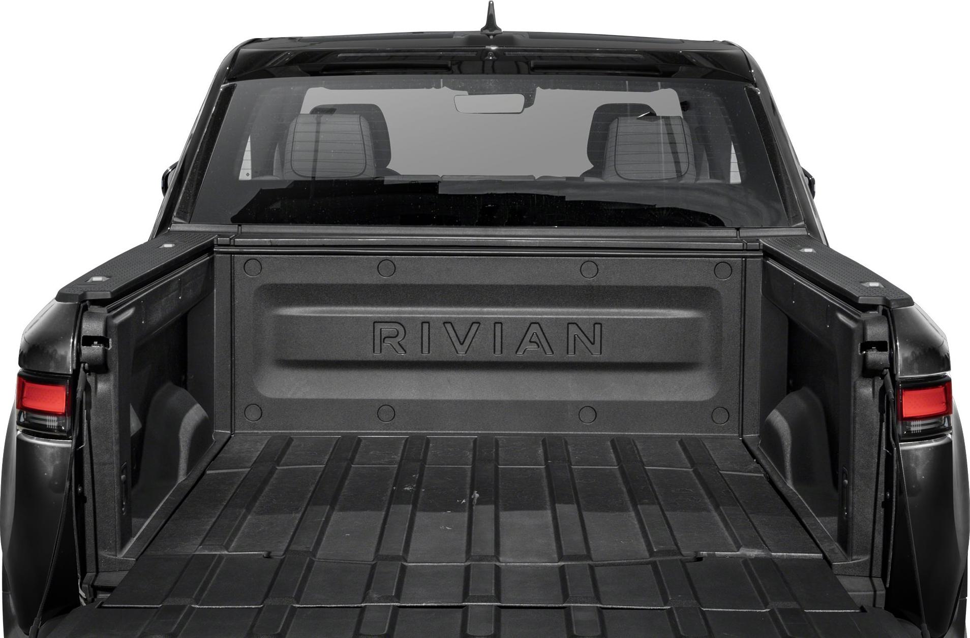 Open truck bed with embossed logo and rugged textured cargo floor
