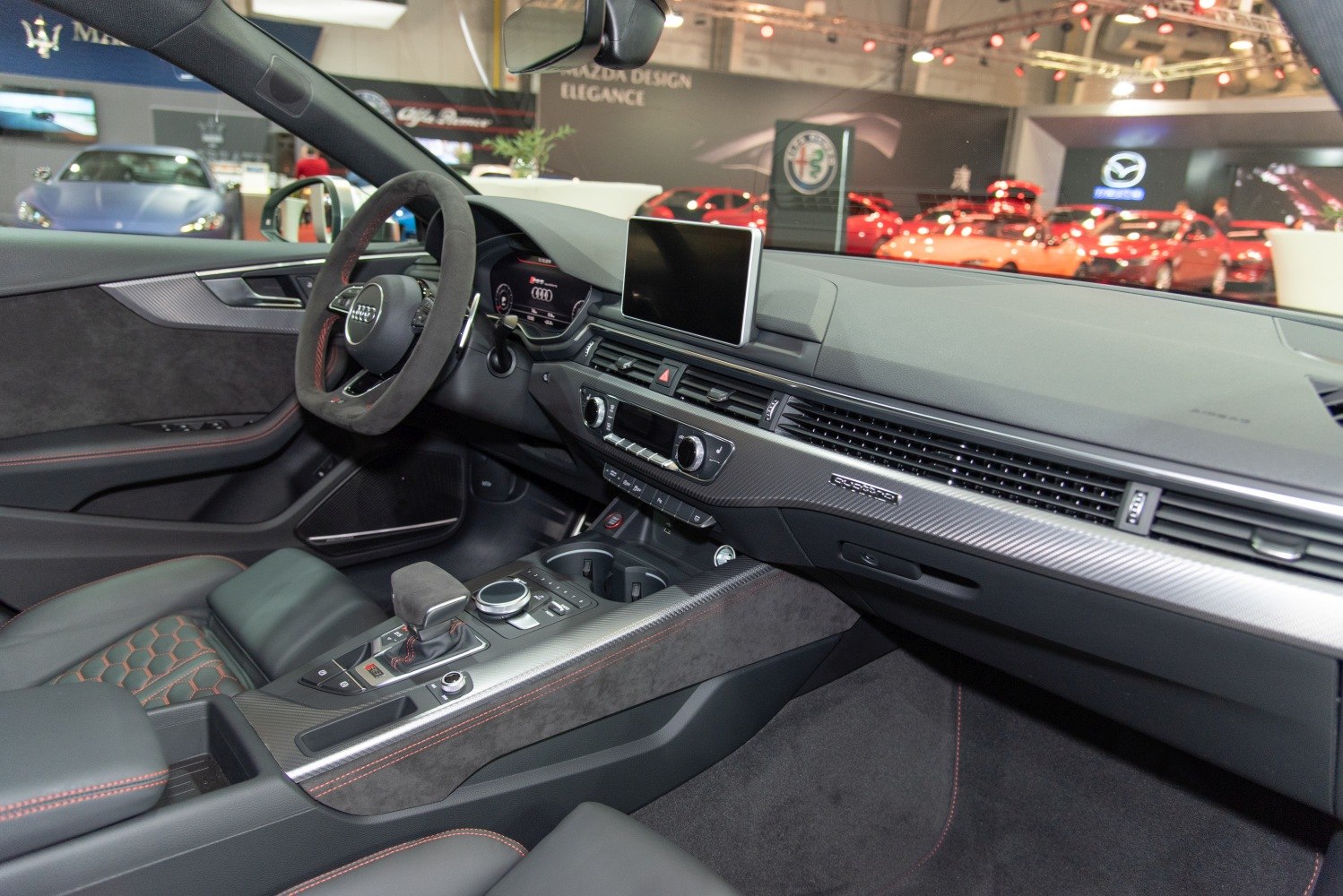 Luxury car interior with digital display and advanced controls