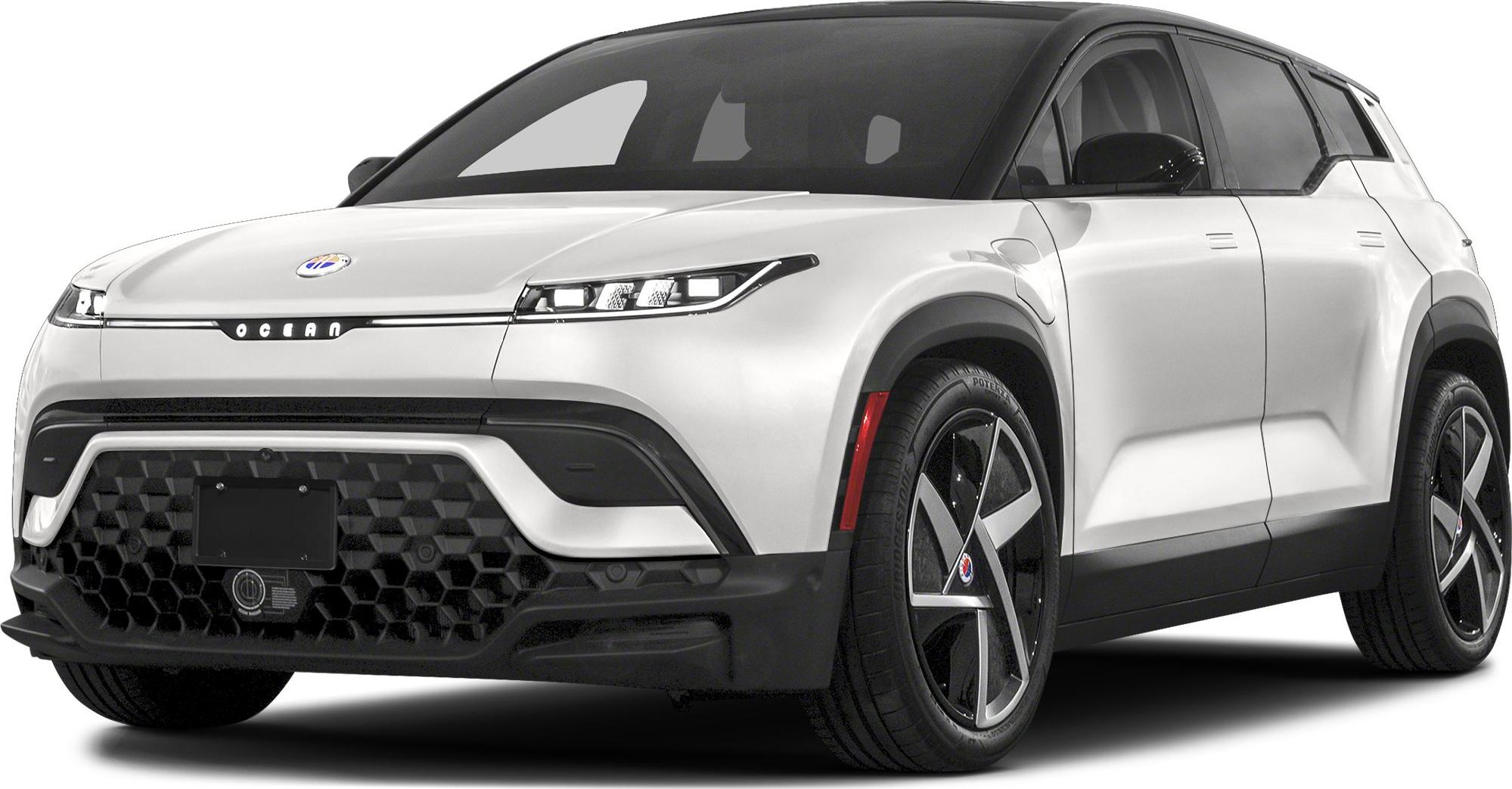 SUV front view with sleek headlights and honeycomb grille design