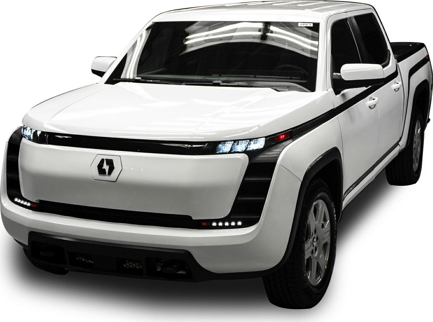 Front view of electric pickup with LED headlights and sleek design