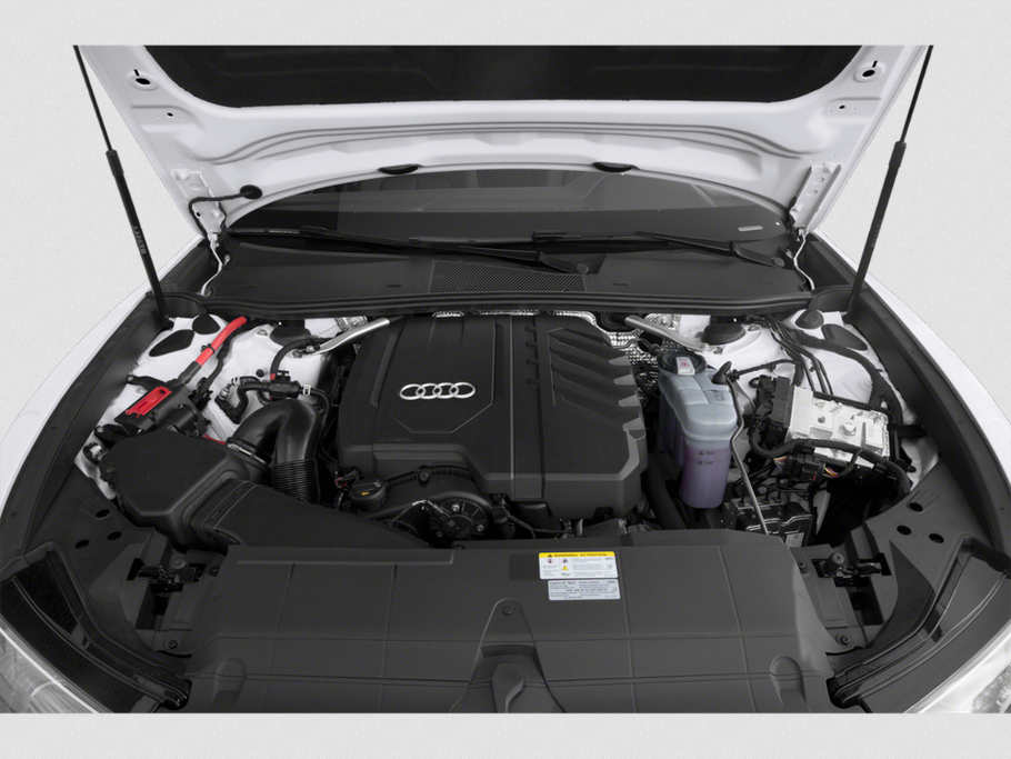 Engine bay with modern powertrain and clean layout under open hood.