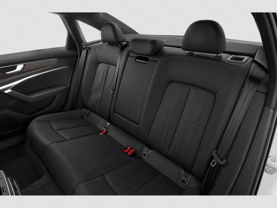 Rear black leather seats with headrests and seat belts
