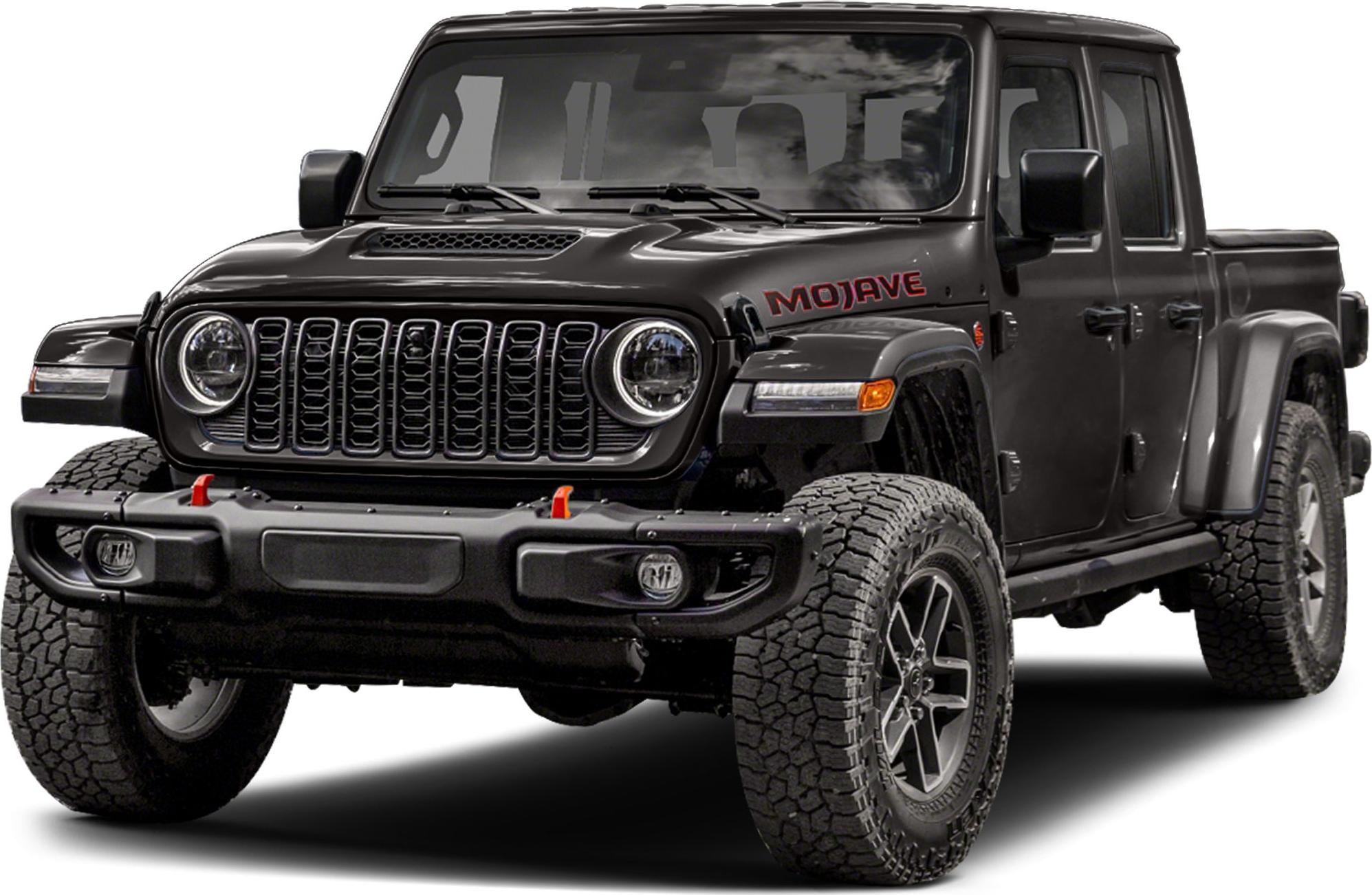 Front view of rugged pickup with distinctive grille and off-road tires