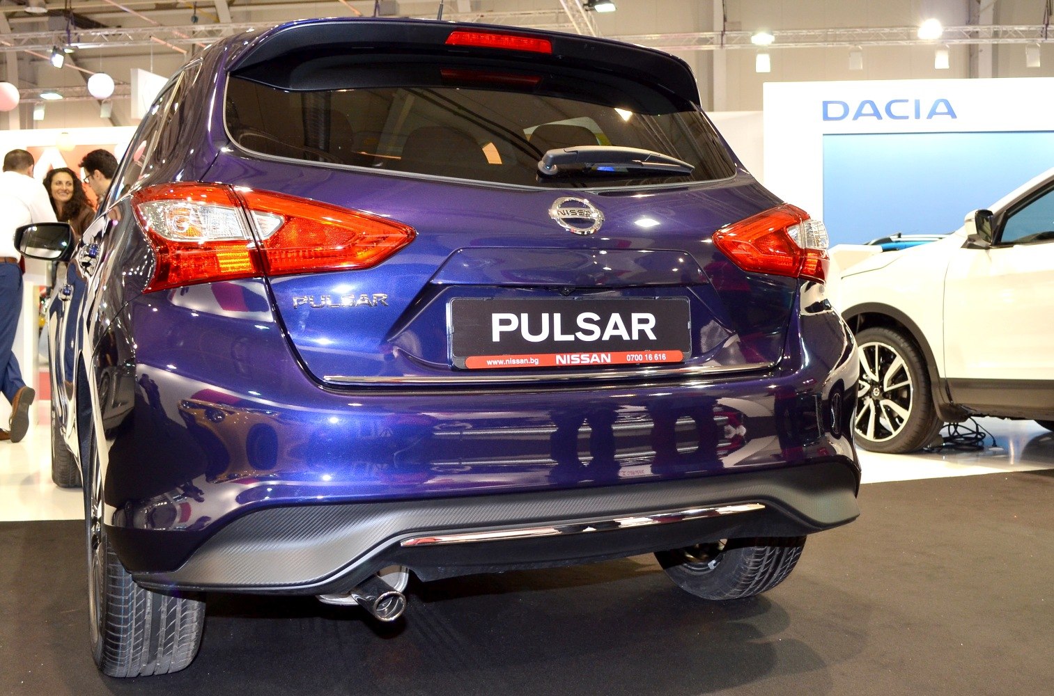 Rear hatchback with LED tail lights and rear spoiler