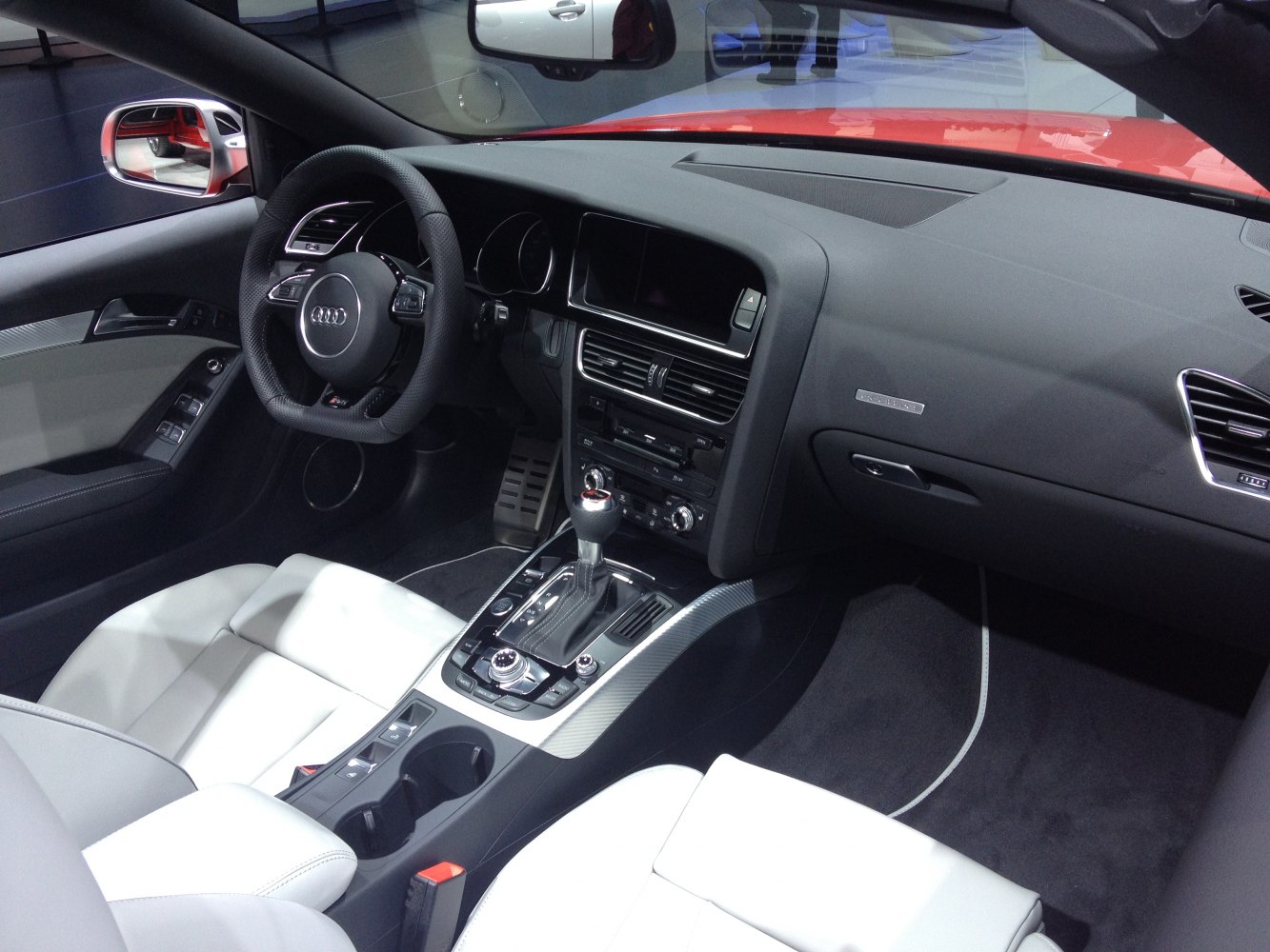 Luxurious car interior with dashboard and automatic gear shift