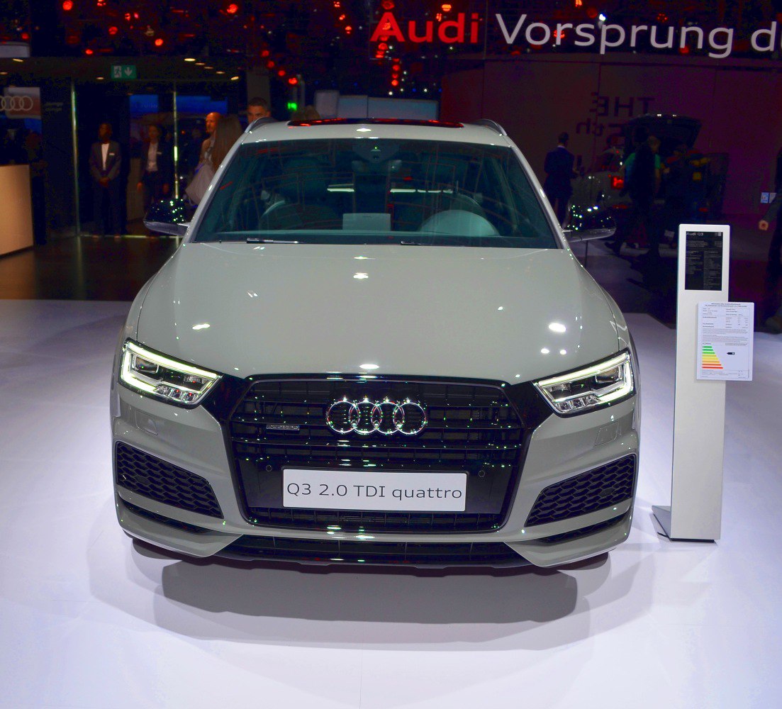 Front view with LED headlights and black grille