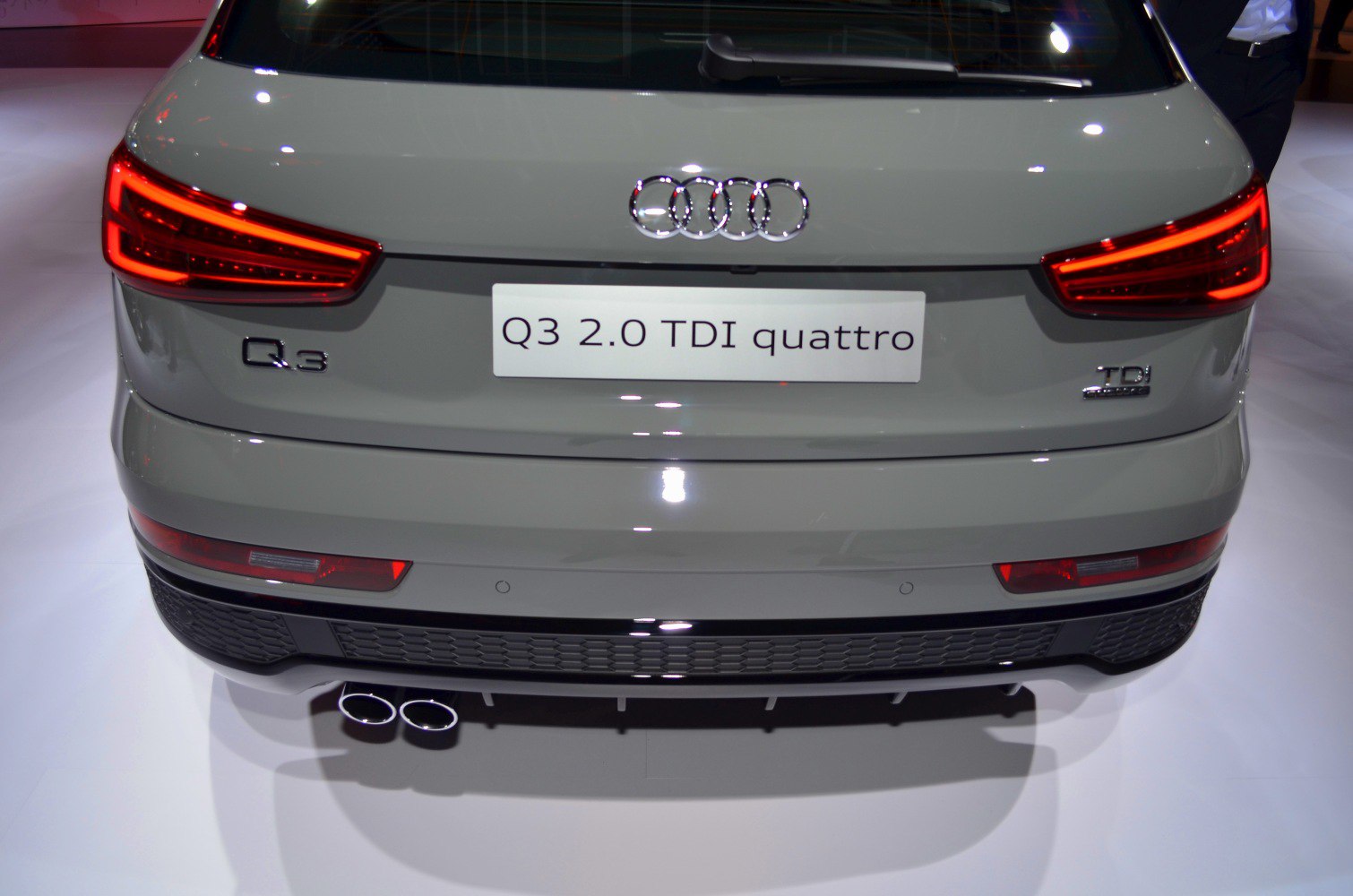 Rear LED taillights and dual exhaust pipes on vehicle rear