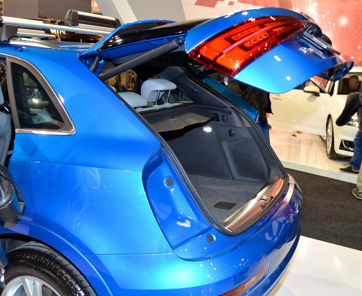 Open rear hatch with visible trunk space and rear light cluster