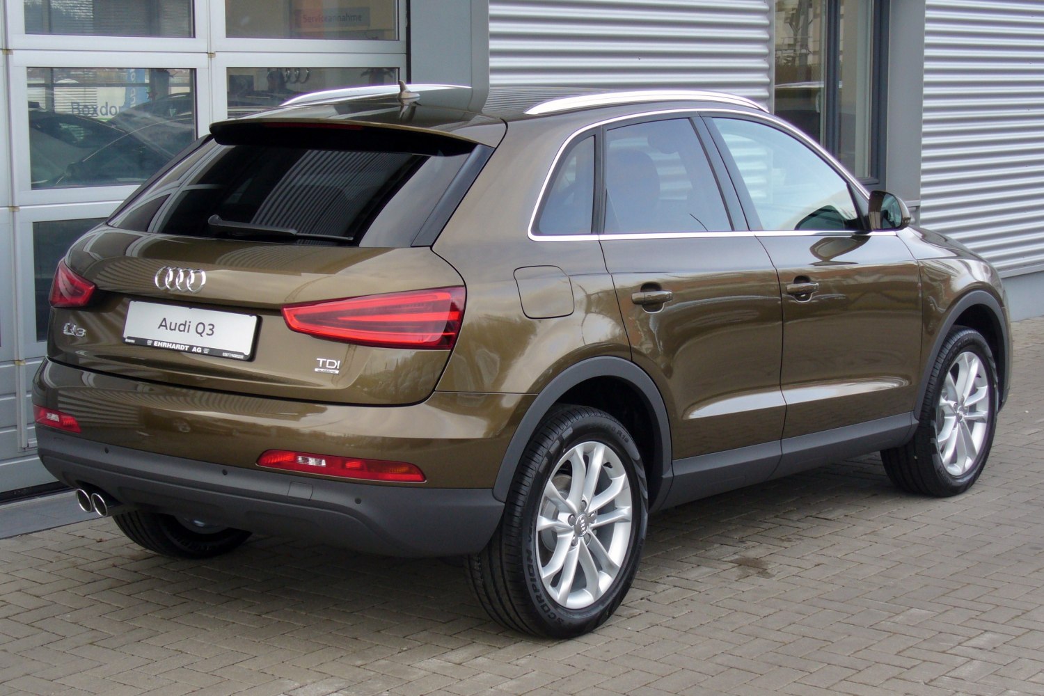 Rear and side view with LED taillights and dual exhaust pipes