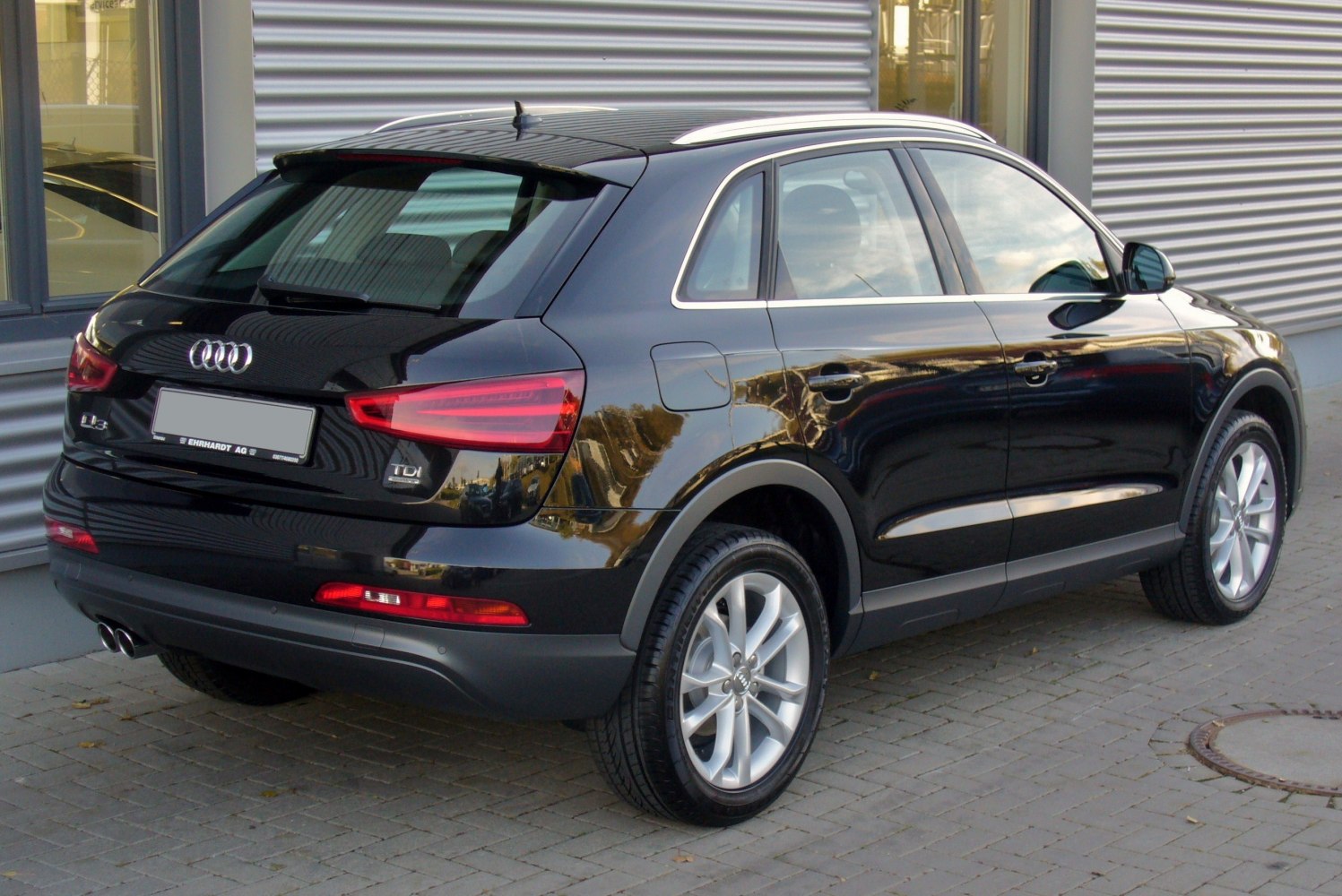 Rear and side view with TDI badge and alloy wheels