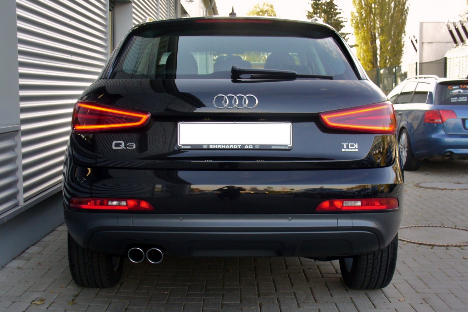 Rear view with LED taillights and dual exhaust pipes