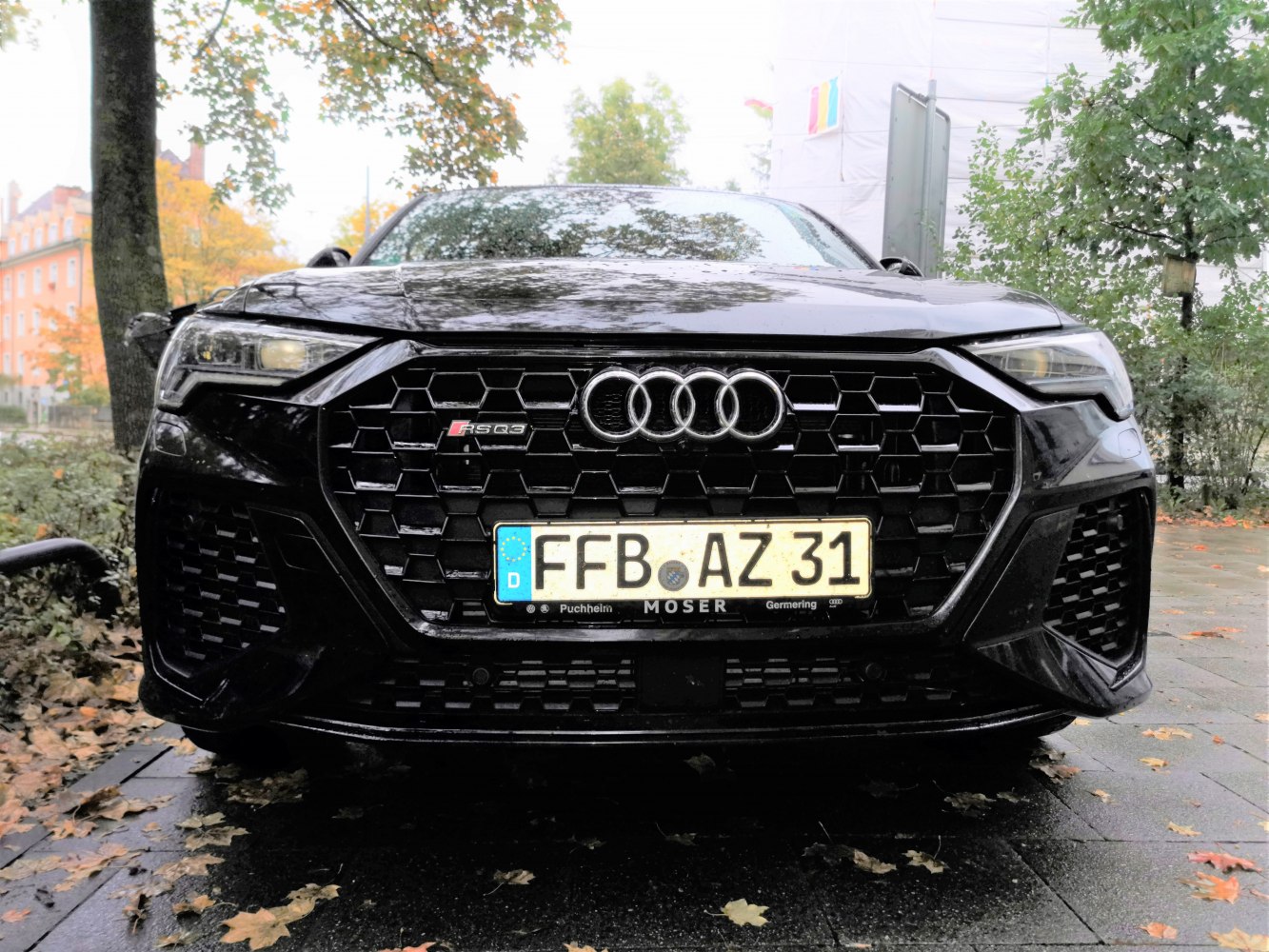 Close-up view of front grille and headlights with honeycomb design
