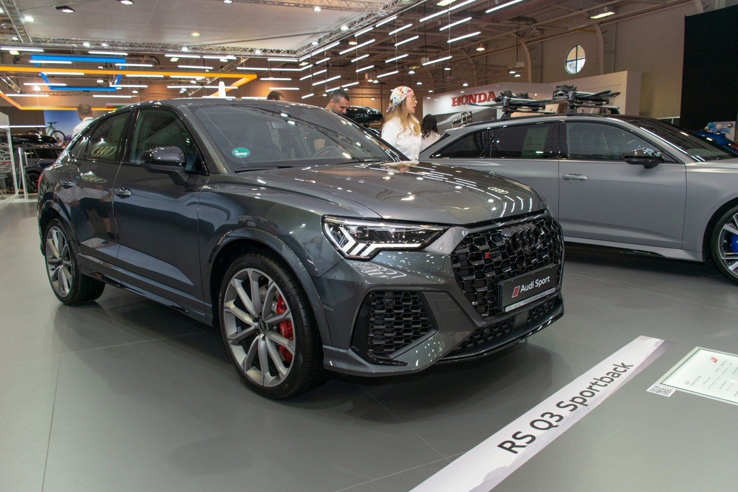 Front view with LED headlights and alloy wheels with red brake calipers