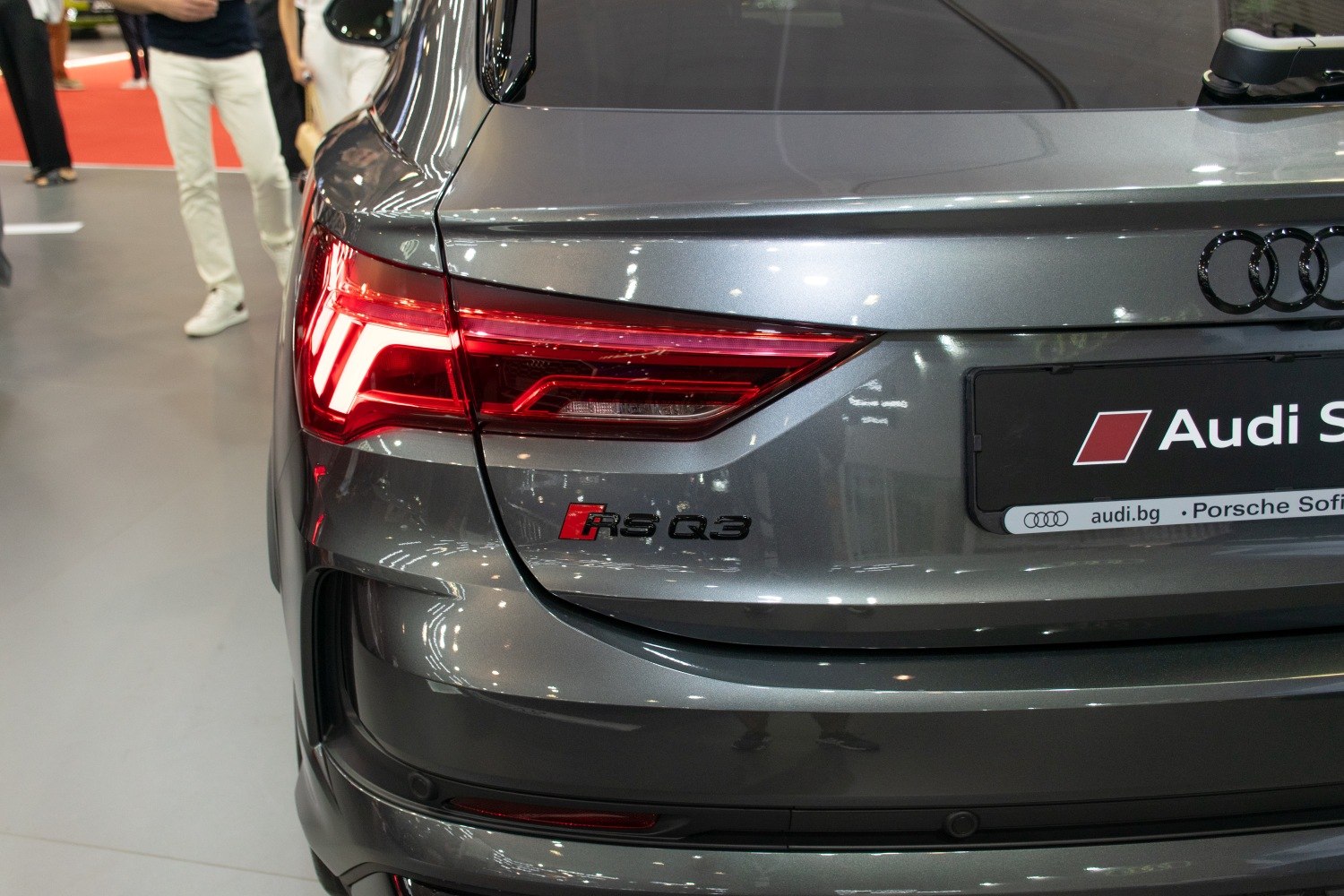 Rear tail light and RSQ3 badge on a gray vehicle