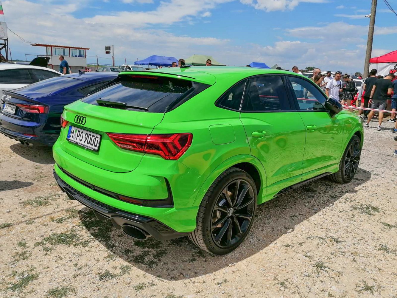 Sporty SUV rear with sharp taillights and black alloy wheels