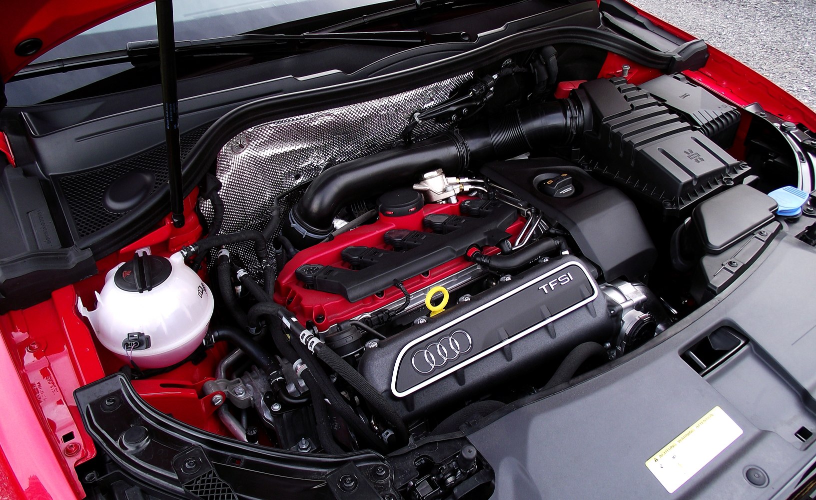 Close-up of Audi TFSI turbo engine with visible components