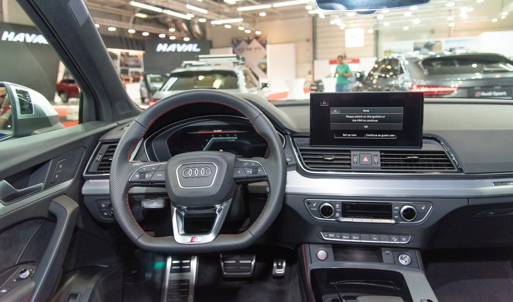 Audi SQ5 digital dashboard with infotainment screen and multifunction steering wheel