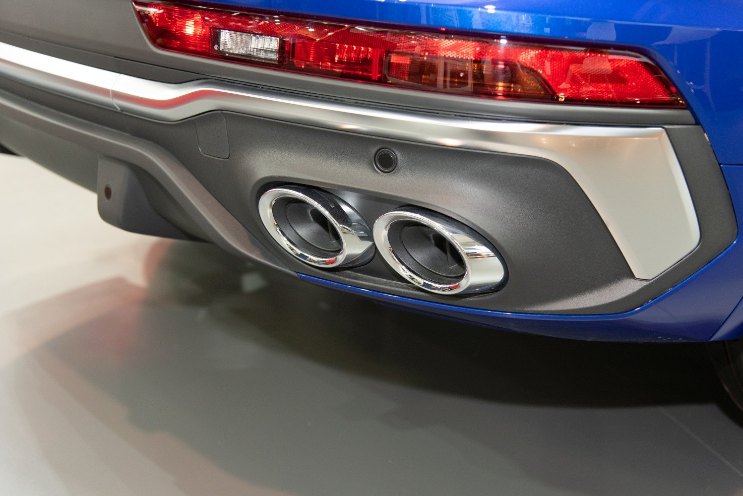Dual oval exhaust and rear taillight close-up