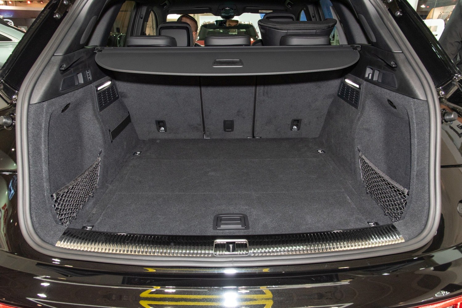 Spacious SUV rear cargo area with retractable cover and side nets
