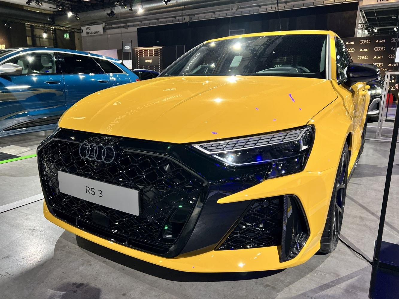 Close-up view of bold front grille and sharp headlights