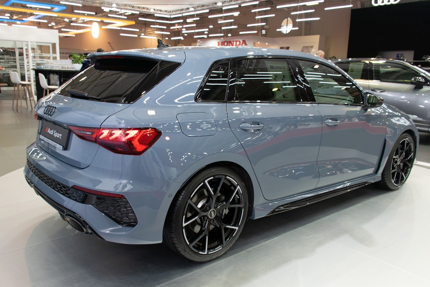 Rear-side view with LED taillights and black alloy wheels