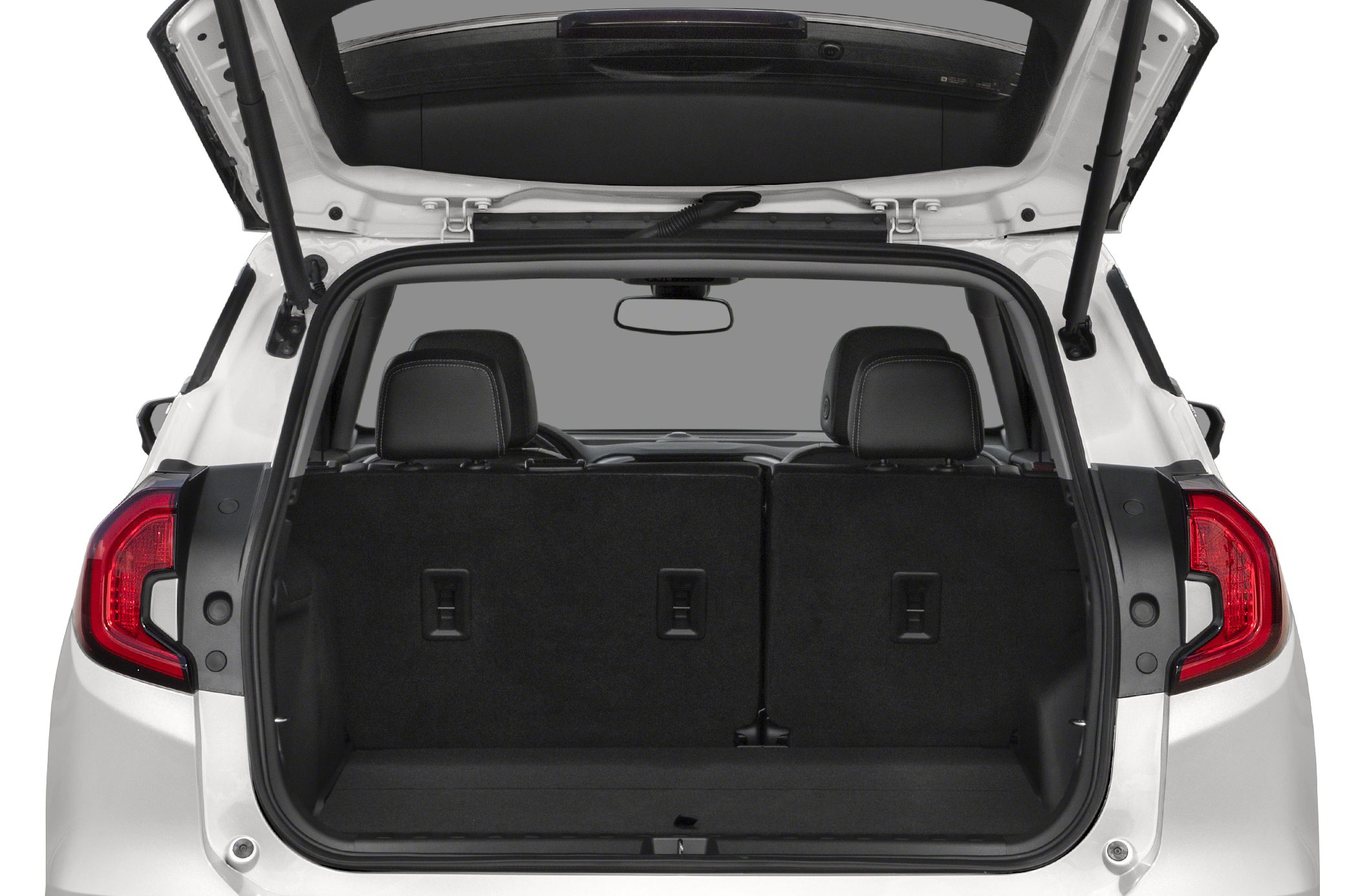 Spacious rear cargo area with split-folding seats and rear hatch open.