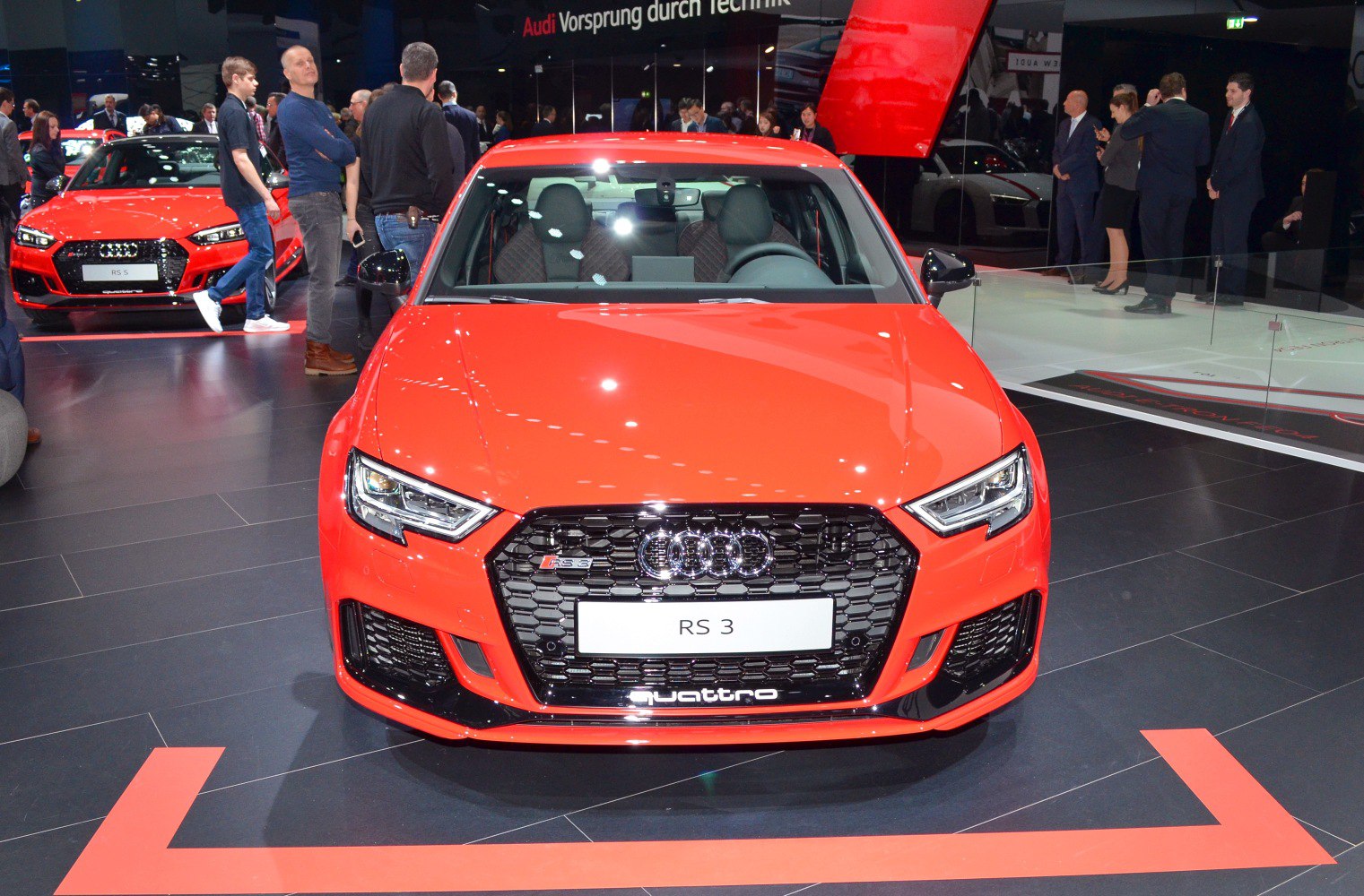 Front view with black honeycomb grille and LED headlights