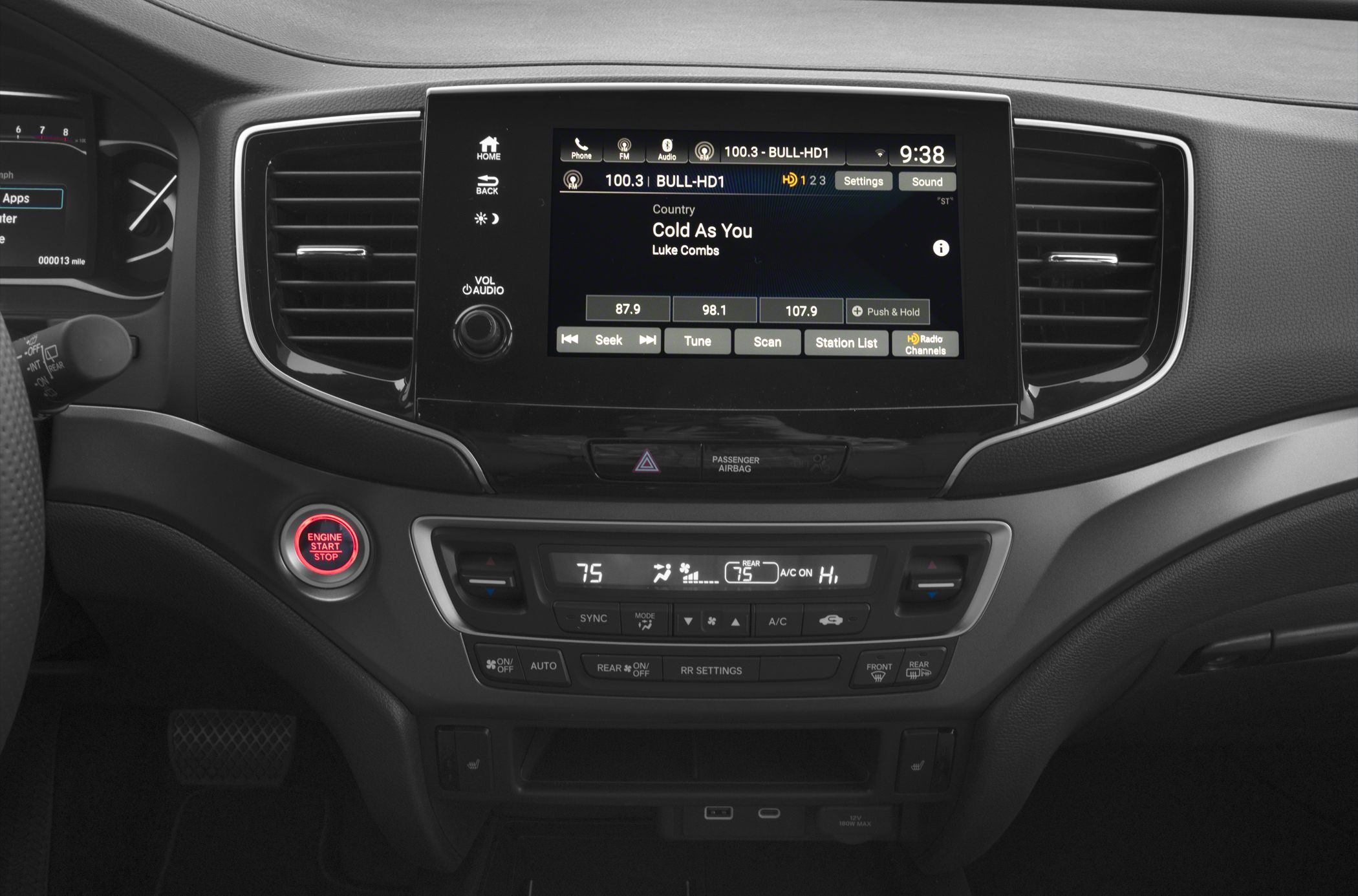 Infotainment touchscreen and digital climate control panel with push start button