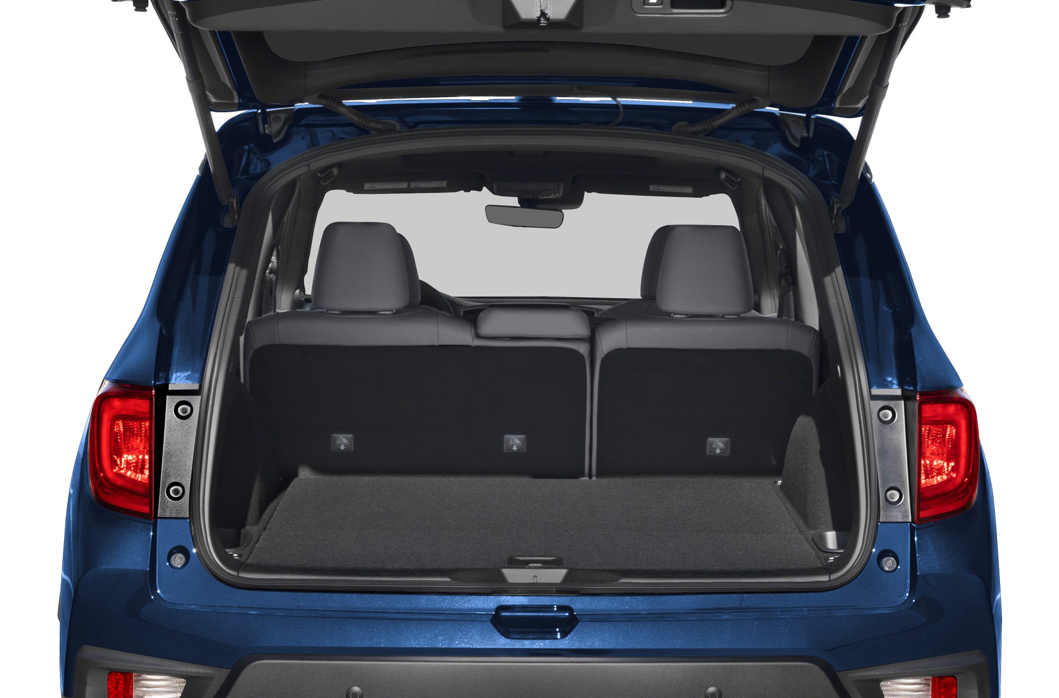 Spacious rear cargo area with open tailgate and foldable rear seats