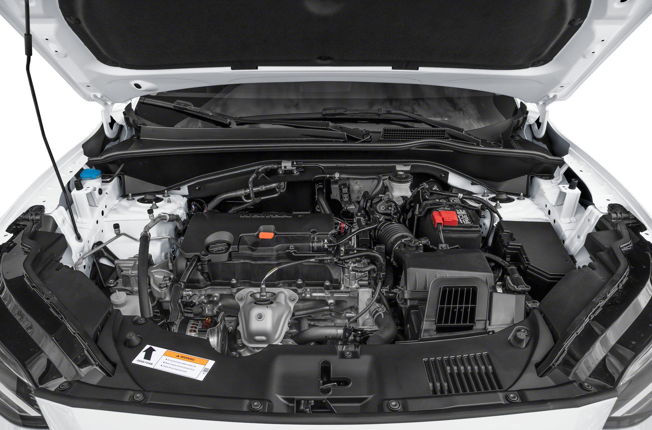 Detailed view of compact car engine bay with visible motor components
