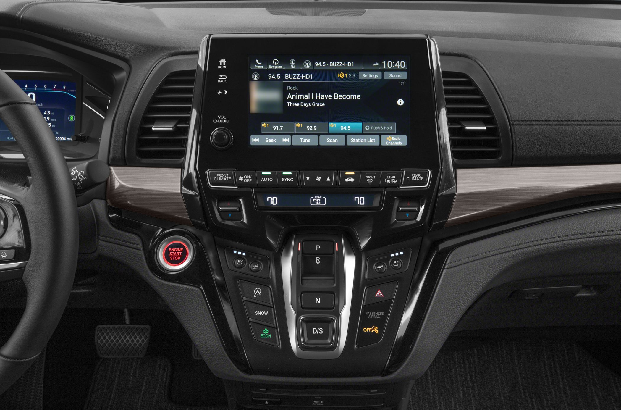 Central console with digital infotainment and control buttons