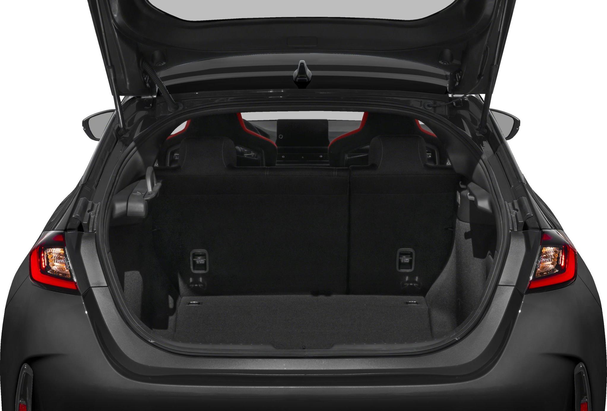 Open trunk space with rear seats and center touchscreen visible