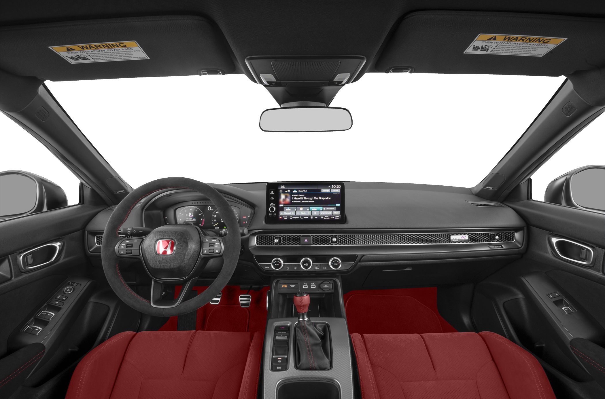 Sporty interior with digital dashboard, manual shifter, and red seats