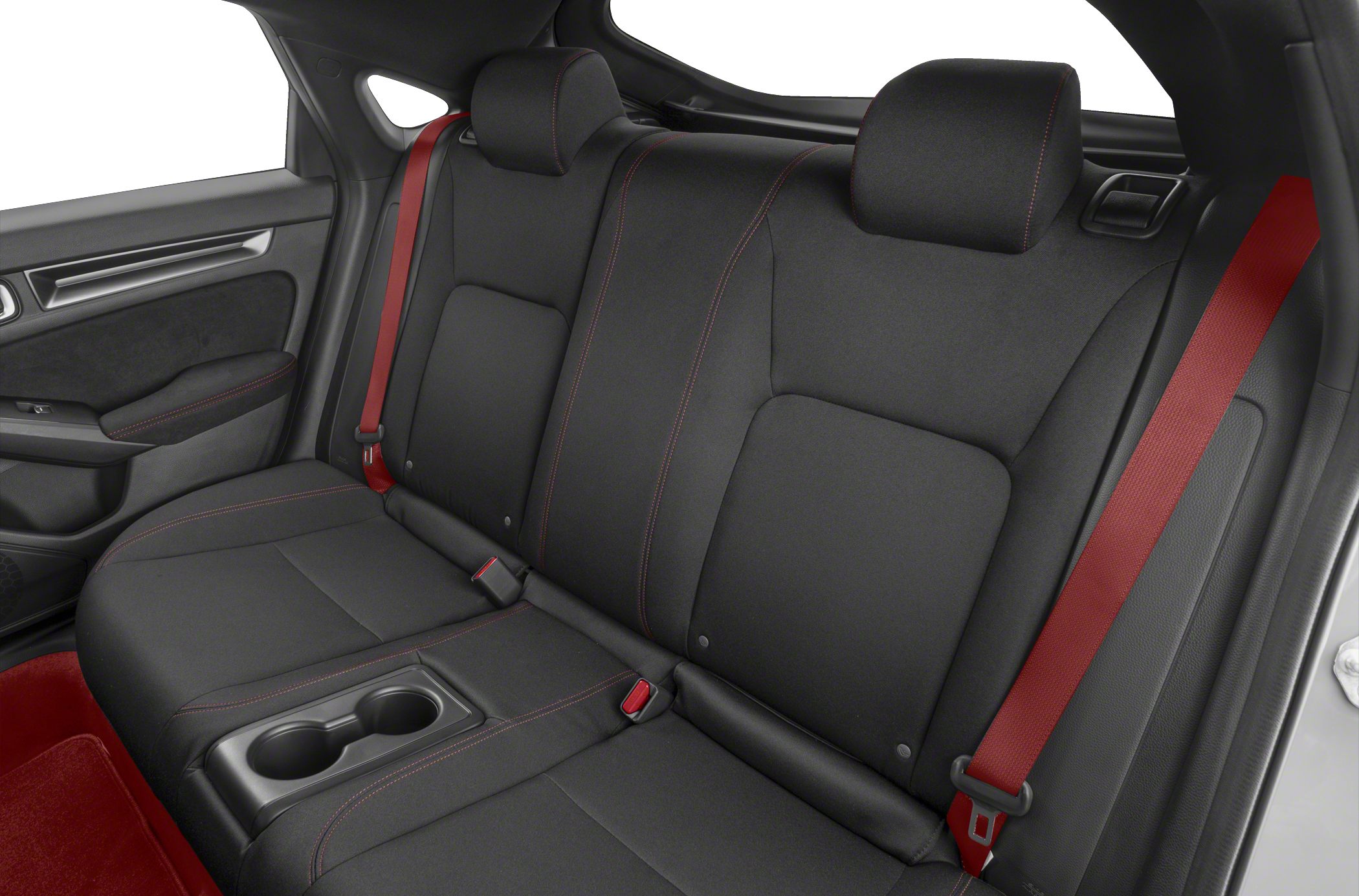 Rear seat interior with black upholstery and red seat belts
