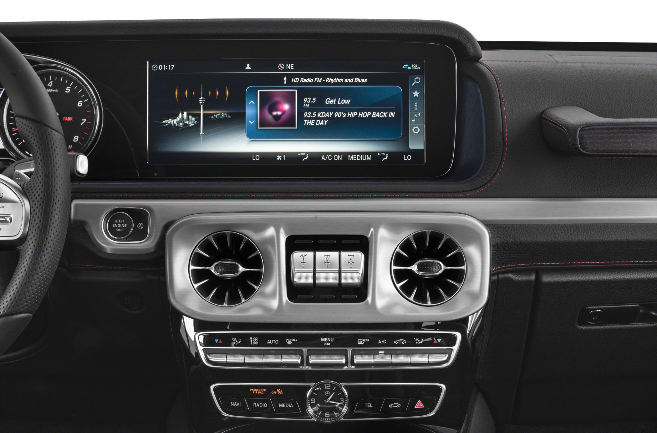 Dashboard with dual turbine-style air vents and central infotainment screen