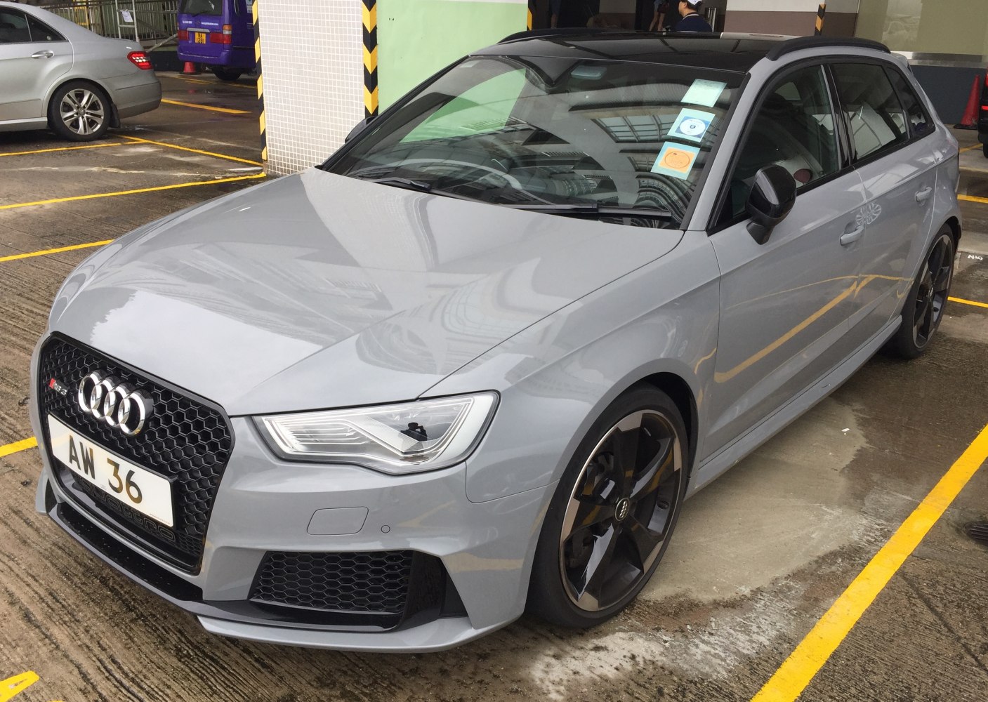 Sporty honeycomb grille and alloy wheels of a hatchback