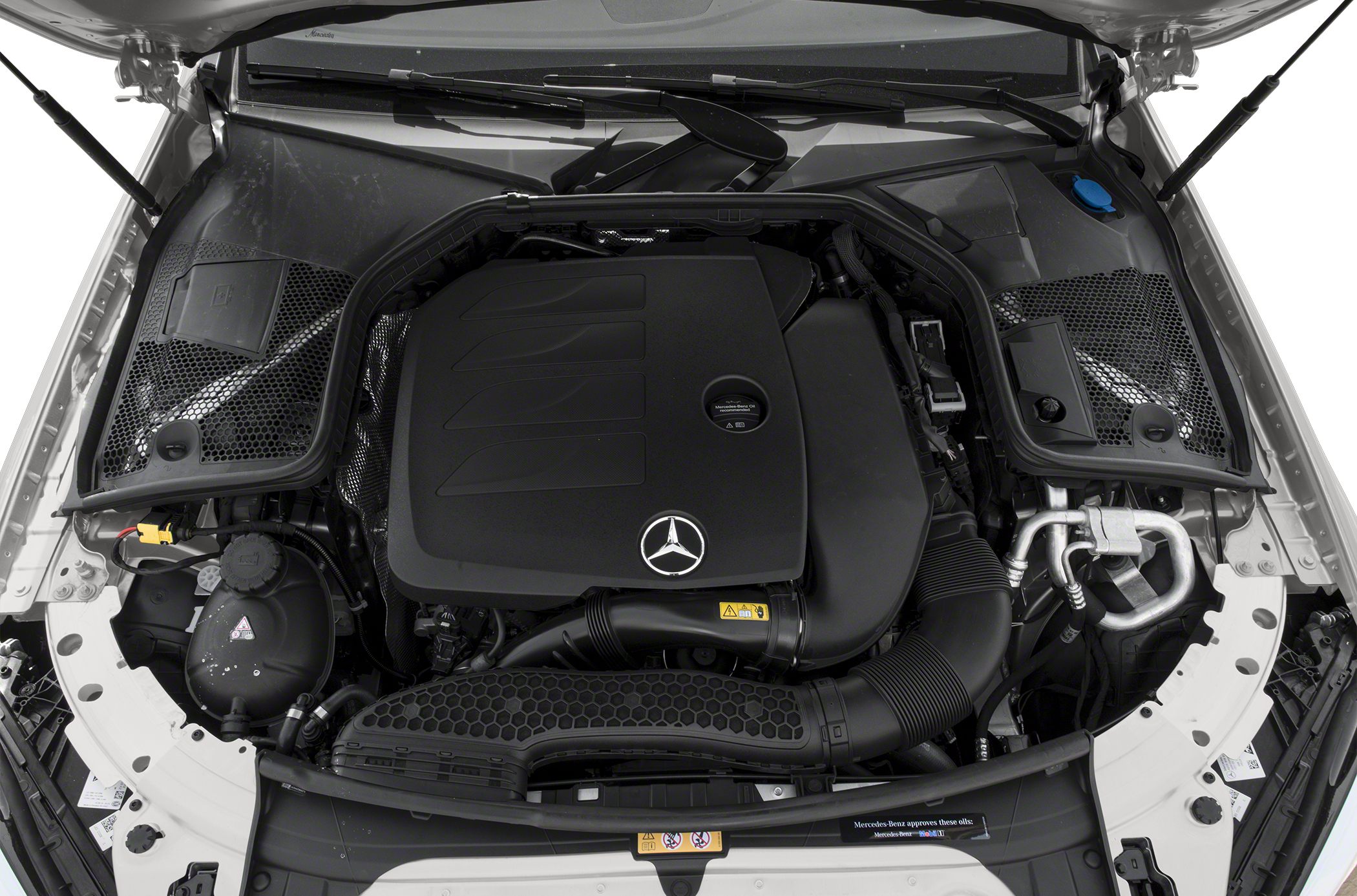 Engine bay with Mercedes emblem and modern engine cover