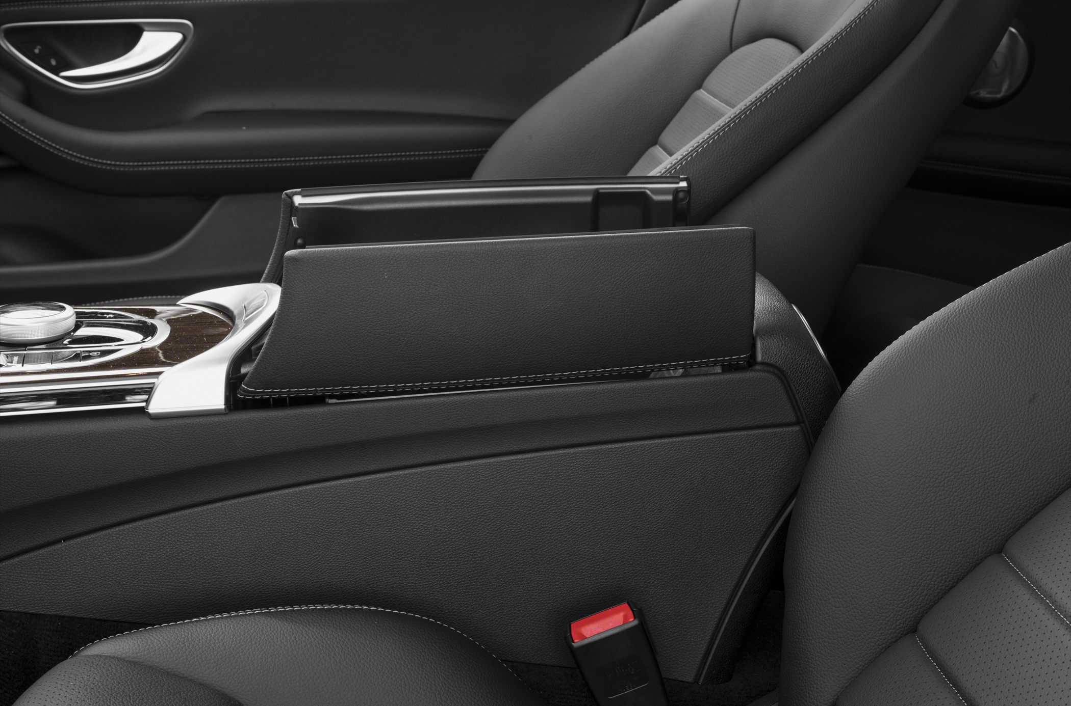 Leather armrest and storage compartment in center console