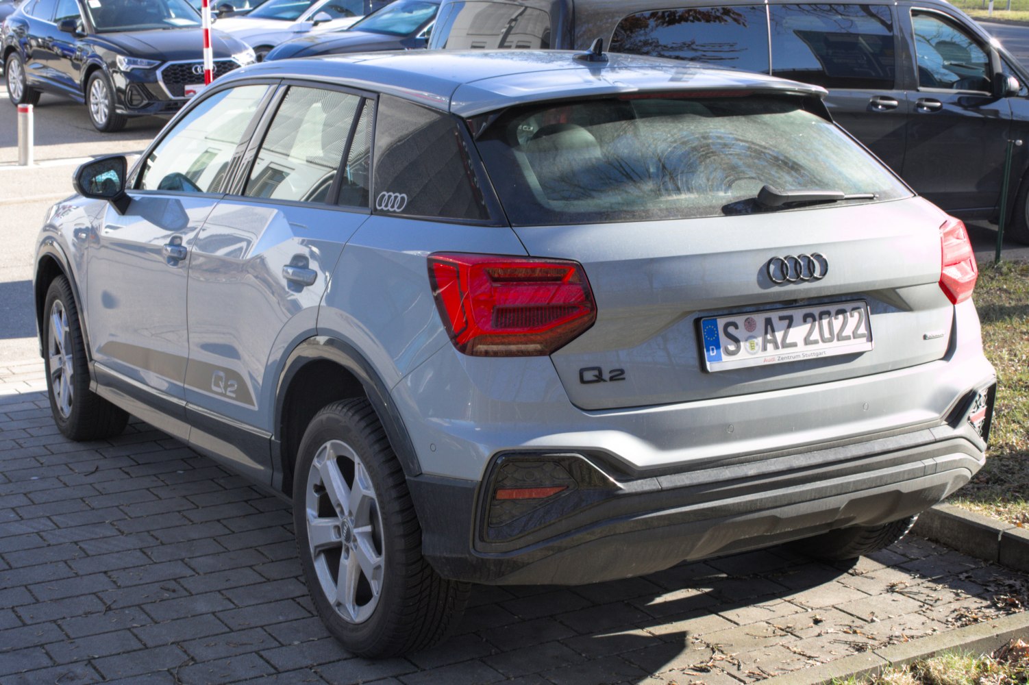 Rear and side profile with updated tail lights and exterior design.