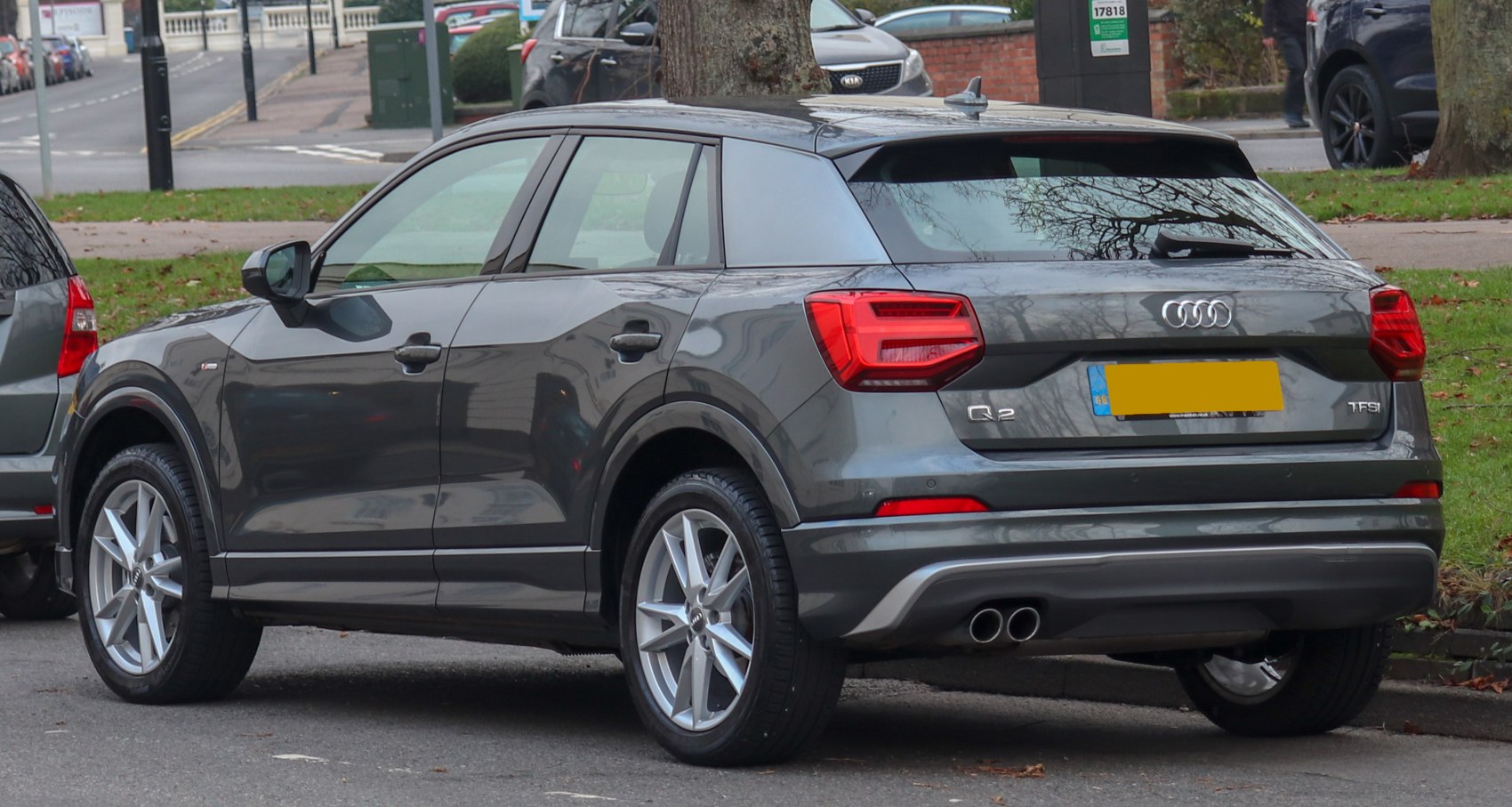 Rear and side view of a compact SUV with distinctive taillights and alloy wheels