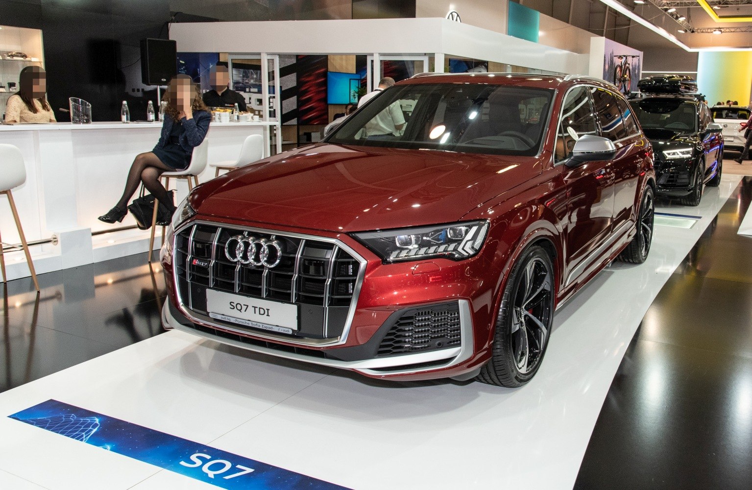 Front view showcasing grille and headlights of a modern luxury SUV
