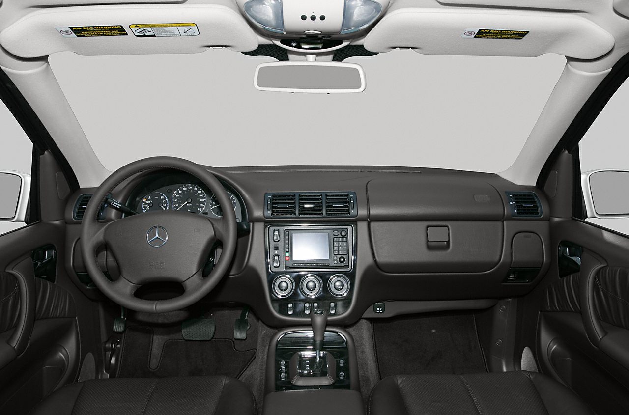 Dashboard and steering wheel with center console, instrument cluster, and automatic shifter
