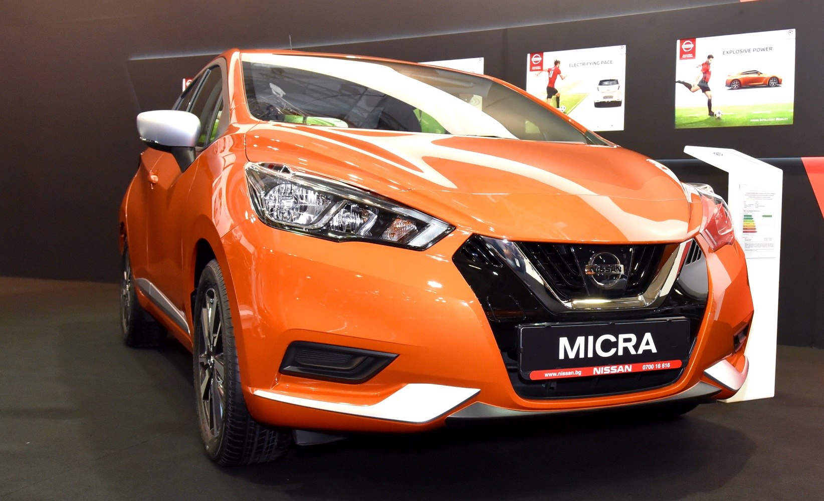 Front view with LED headlights and black grille