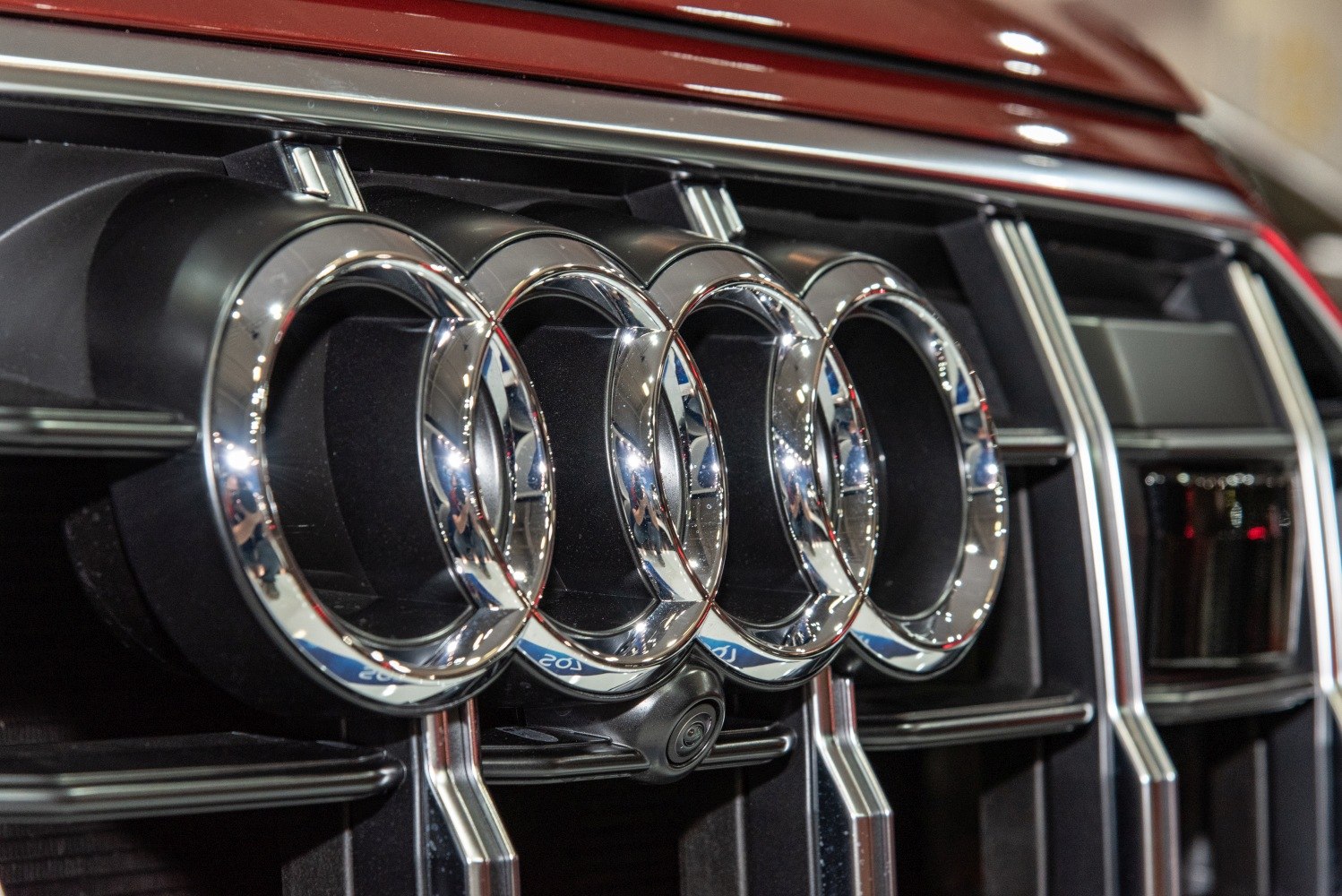 Close-up of chrome front grille rings and integrated camera
