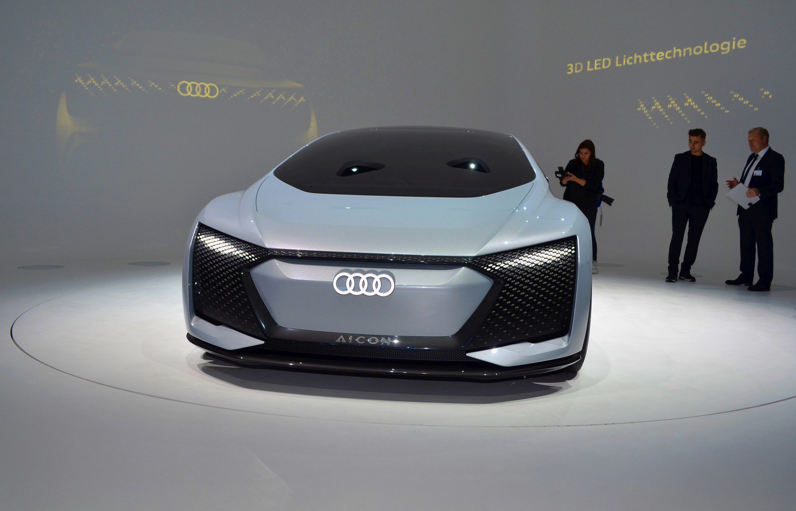 Futuristic front view with 3D LED lighting and sleek aerodynamic design
