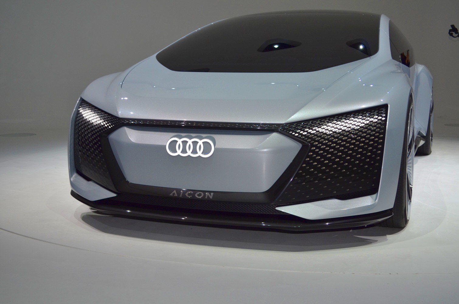 Futuristic front design with unique grille and LED lights