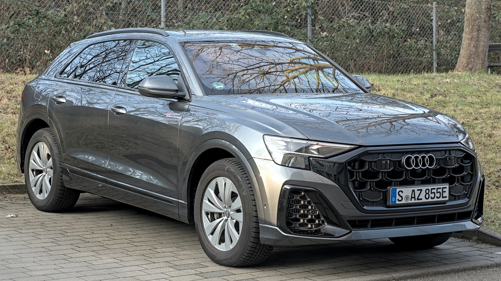 Modern front grille and sharp LED headlights on a luxury SUV
