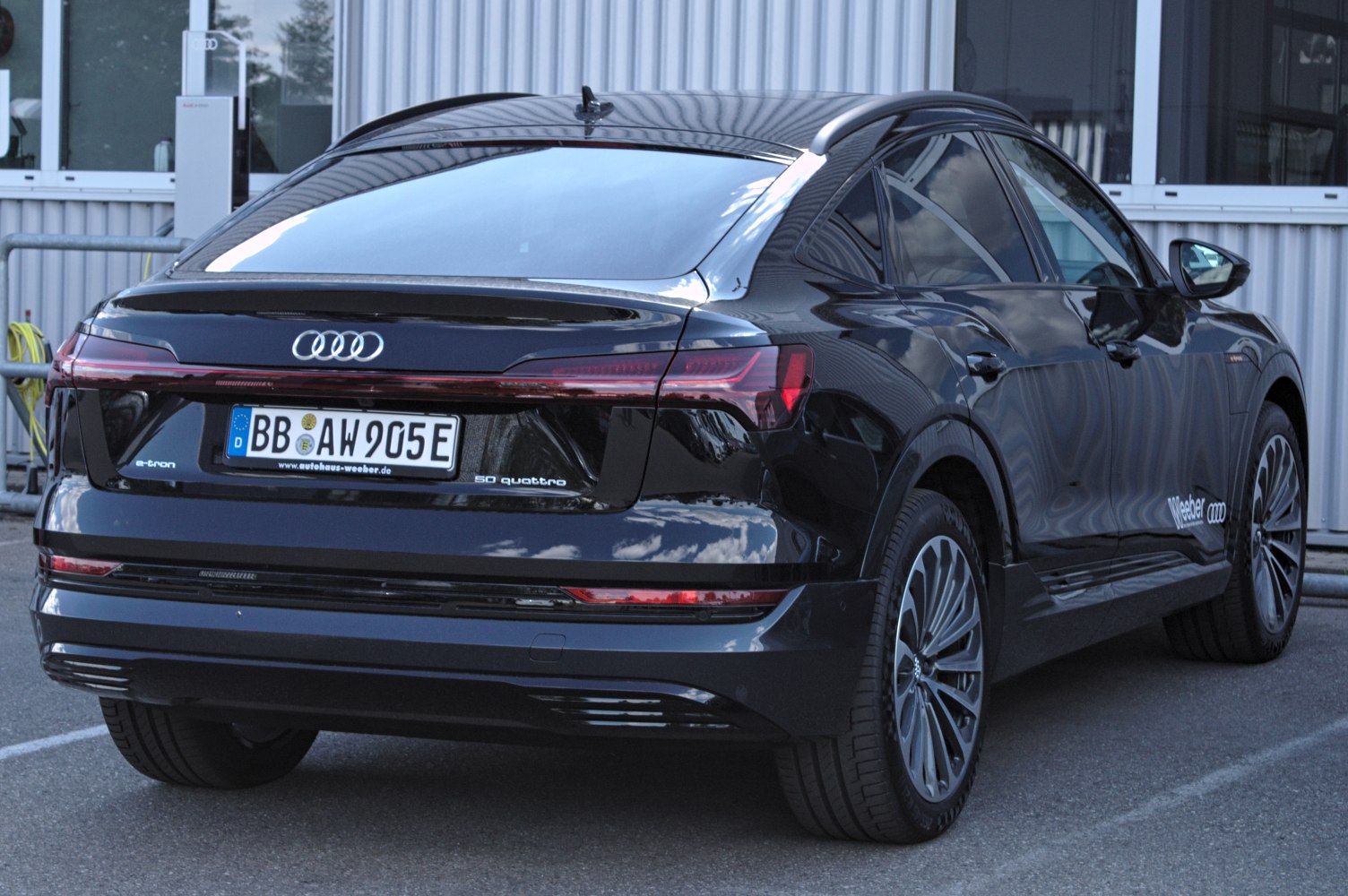 Sleek rear with horizontal LED tail lights and stylish alloy wheels