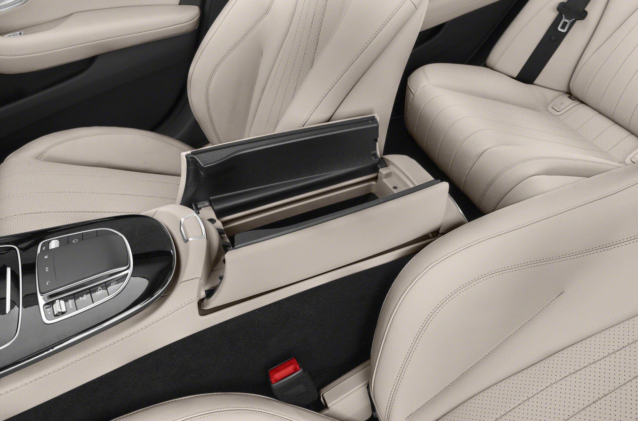 Beige leather seats and open center armrest storage console